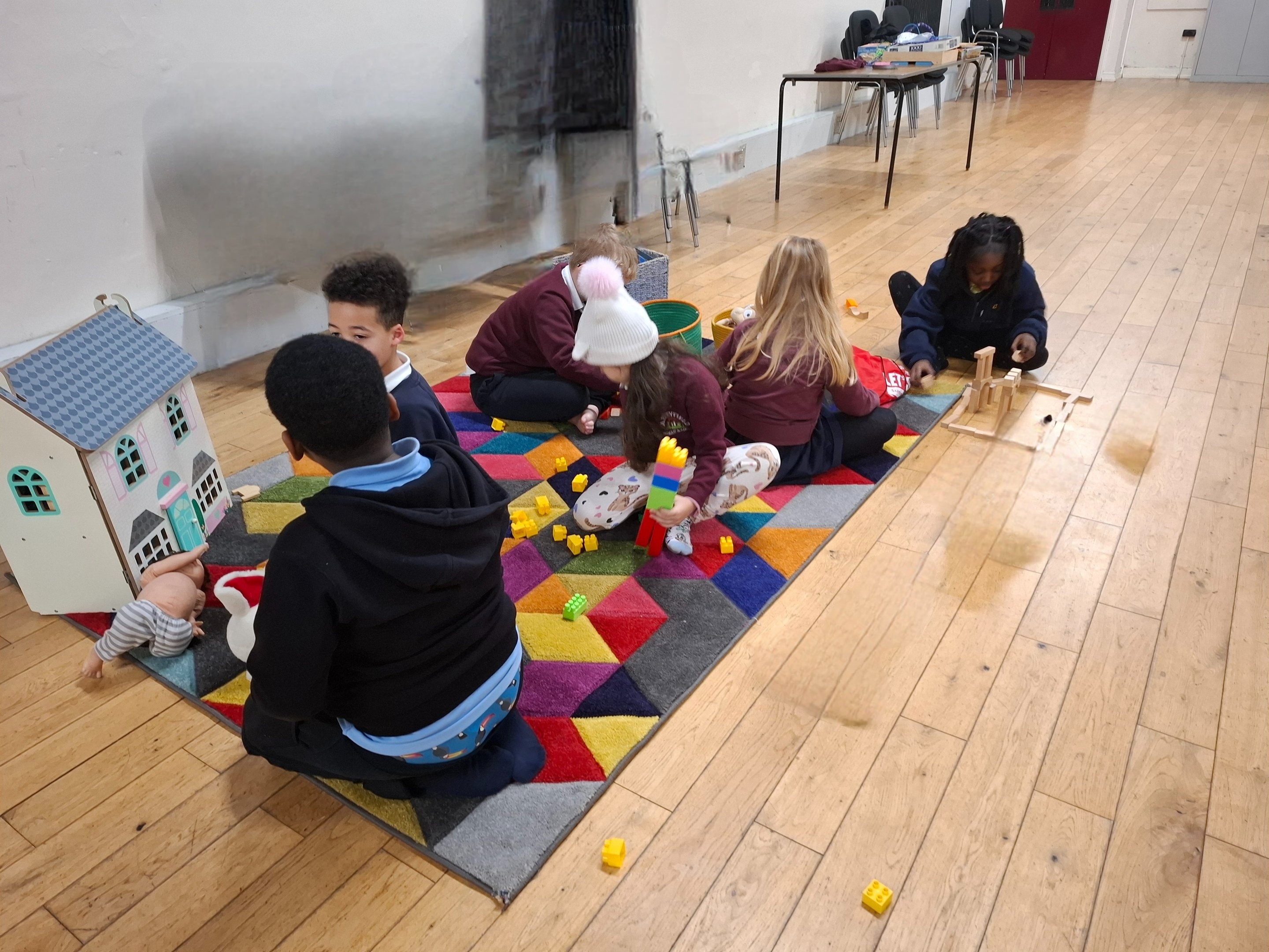 Children engaged in creative play at Happy Hearts